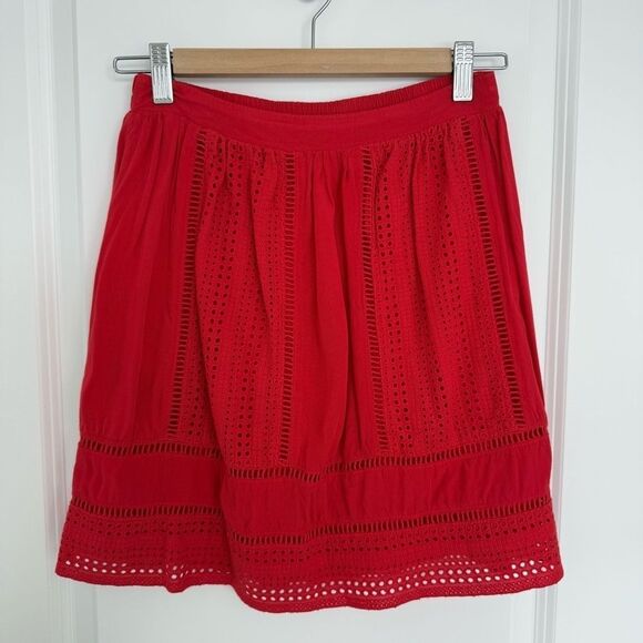 SOLITAIRE | Red Pleated Skirt with Eyelet cut out - Picture 1 of 8